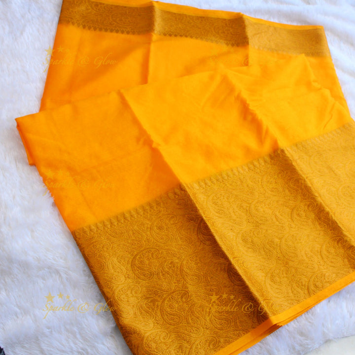 Simple and elegant yellow colour banarasi silk saree with blouse piece