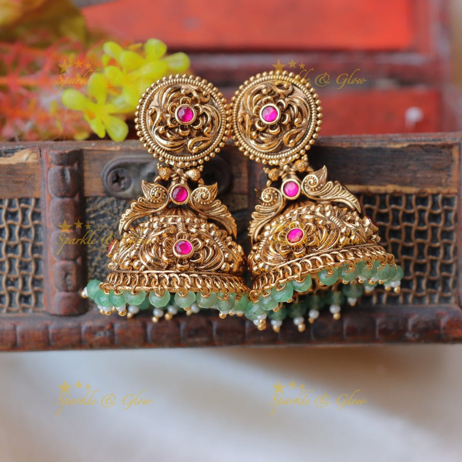 Pretty floral and peacock design jadau gold jumka with mint green beads - Pink - Sparkle and Glow - Pink - 