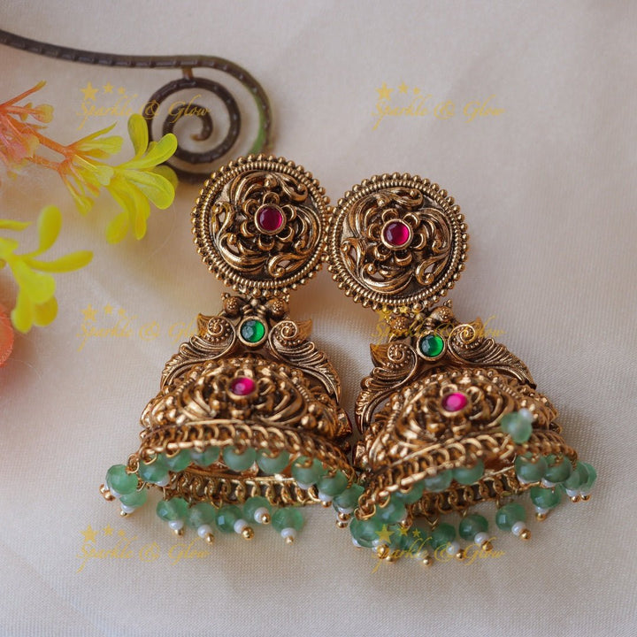 Pretty floral and peacock design jadau gold jumka with mint green beads - Pink - Sparkle and Glow - Pink Green - 