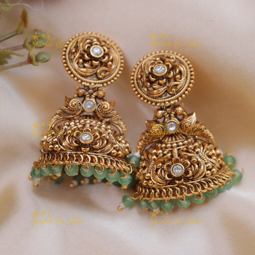 Pretty floral and peacock design jadau gold jumka with mint green beads - Pink - Sparkle and Glow - White - 