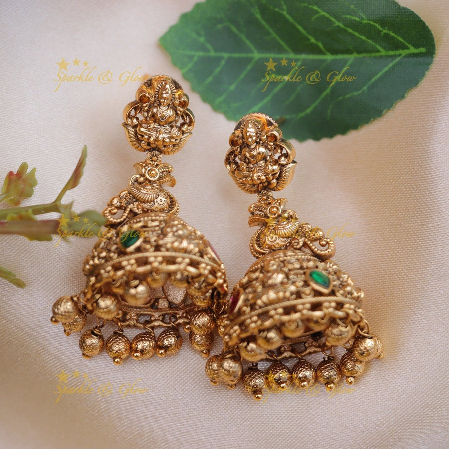 Grand lakshmi and peacock carved gold jumka - Mint green - Sparkle and Glow - Gold - 