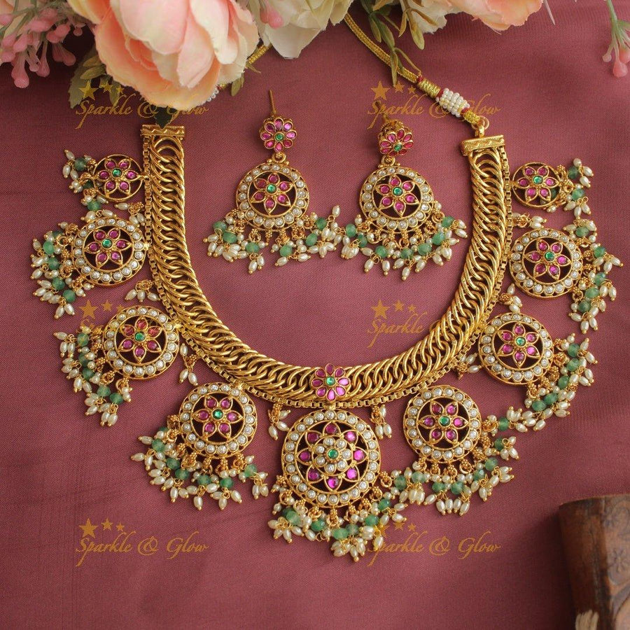 Stunning jadau floral design bottu short necklace with pearl and mint green beads - Sparkle and Glow