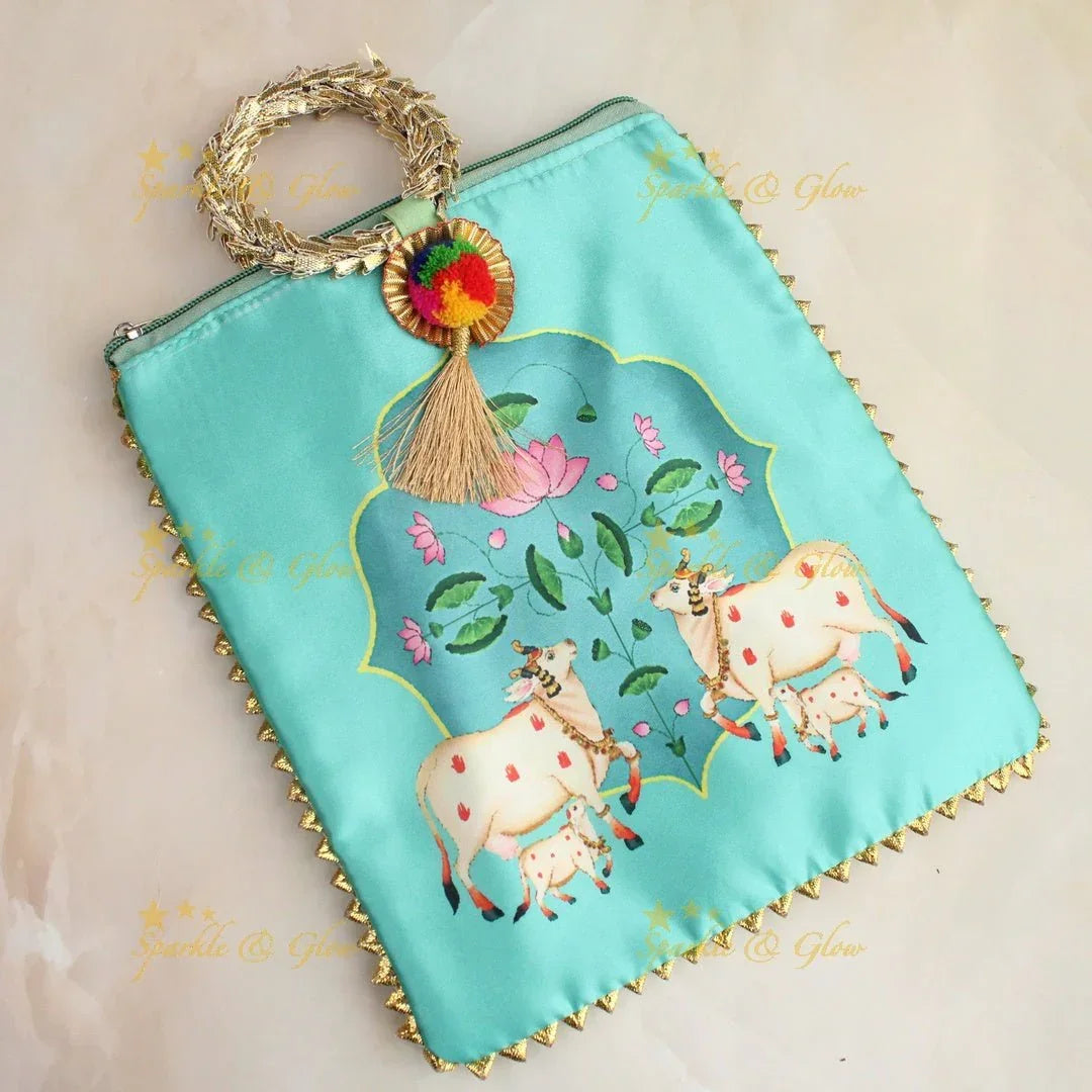 Beautiful cow printed potli bags - set of 10 - Assorted colours for return gifts - Sparkle and Glow