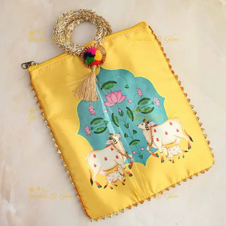 Beautiful cow printed potli bags - set of 10 - Assorted colours for return gifts - Sparkle and Glow
