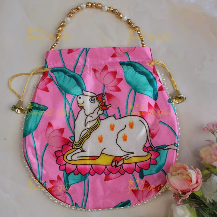 Pretty nandi print potli bags with gold beads - set of 10 - Assorted colours for return gifts - Sparkle and Glow
