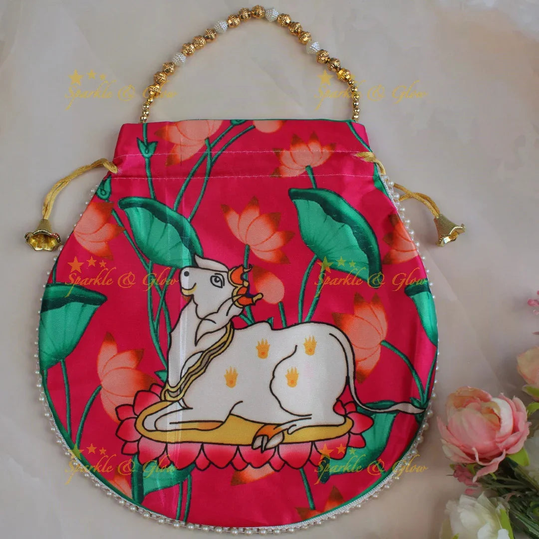 Pretty nandi print potli bags with gold beads - set of 10 - Assorted colours for return gifts - Sparkle and Glow