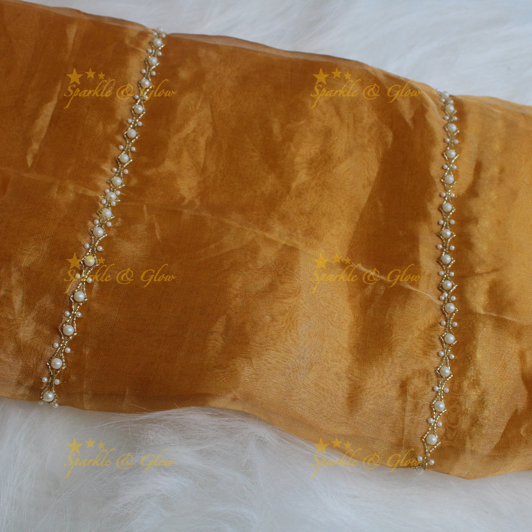 Grand gold colour silk organza saree with beads design with design blouse piece