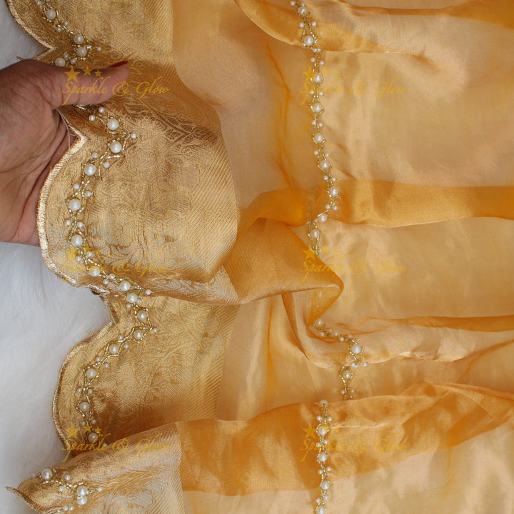 Grand gold colour silk organza saree with beads design with design blouse piece