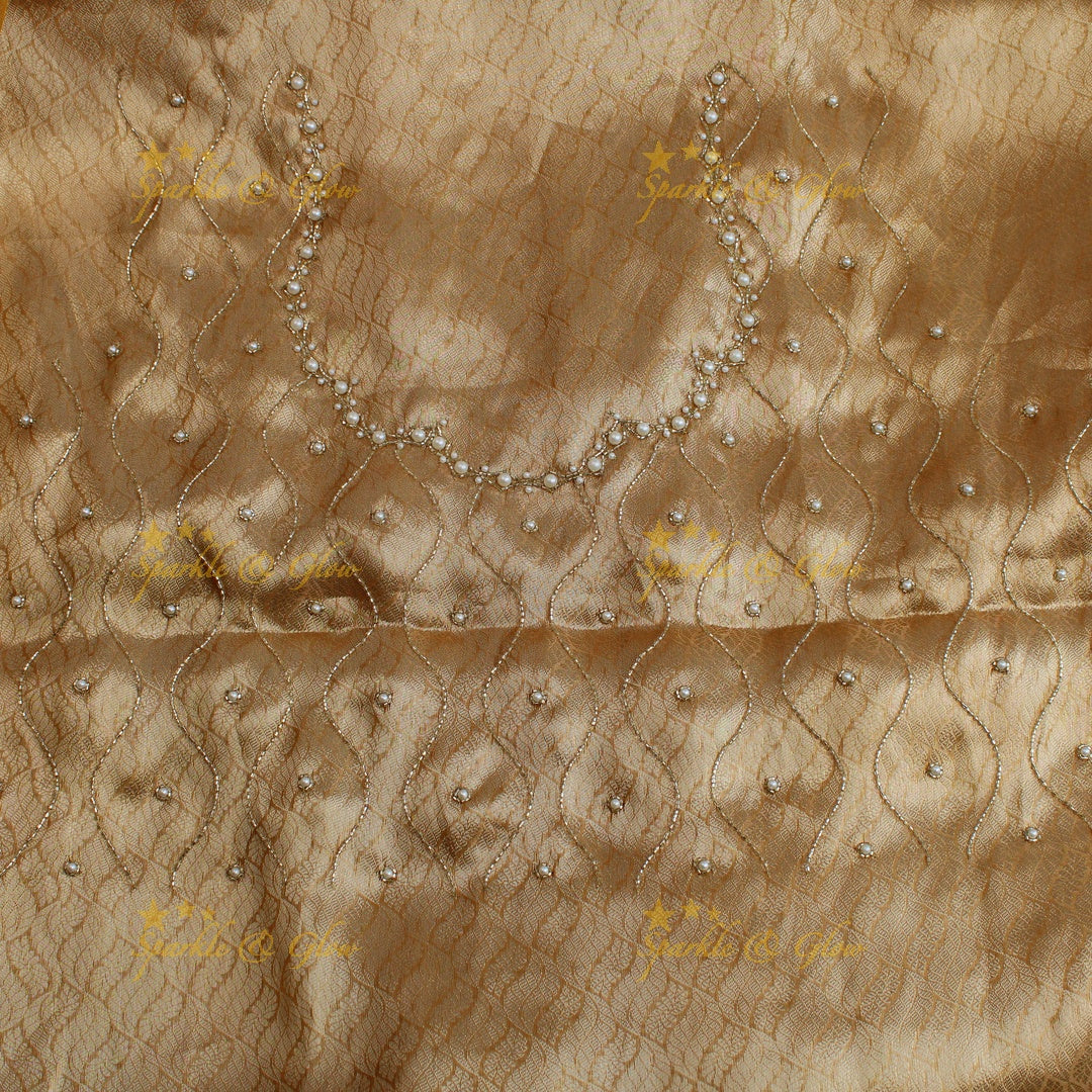 Grand gold colour silk organza saree with beads design with design blouse piece
