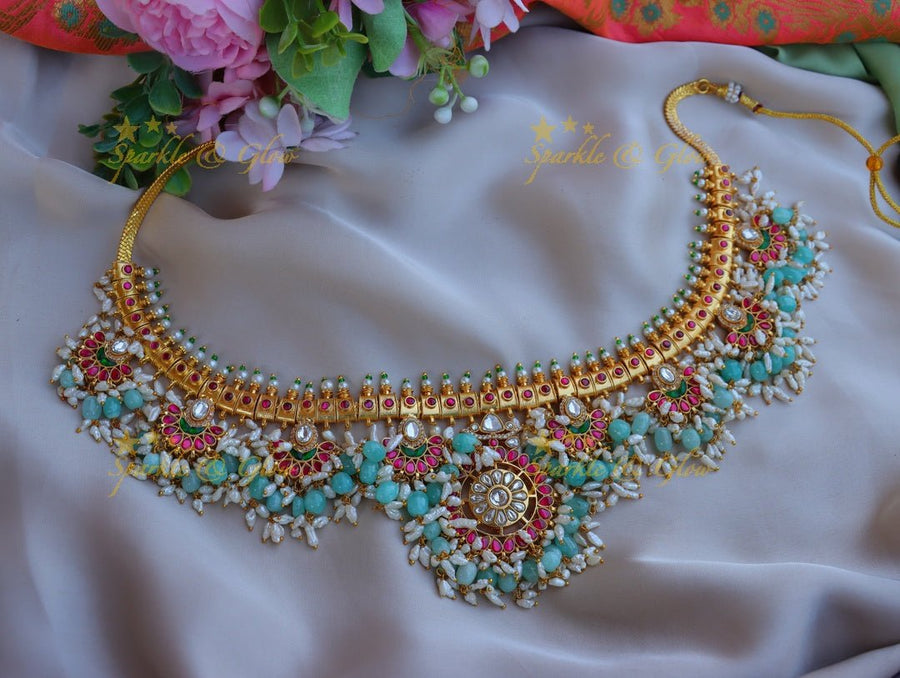 Gorgeous floral and moon design jadau hip chain with mint green beads and rice pearls - Sparkle and Glow - 