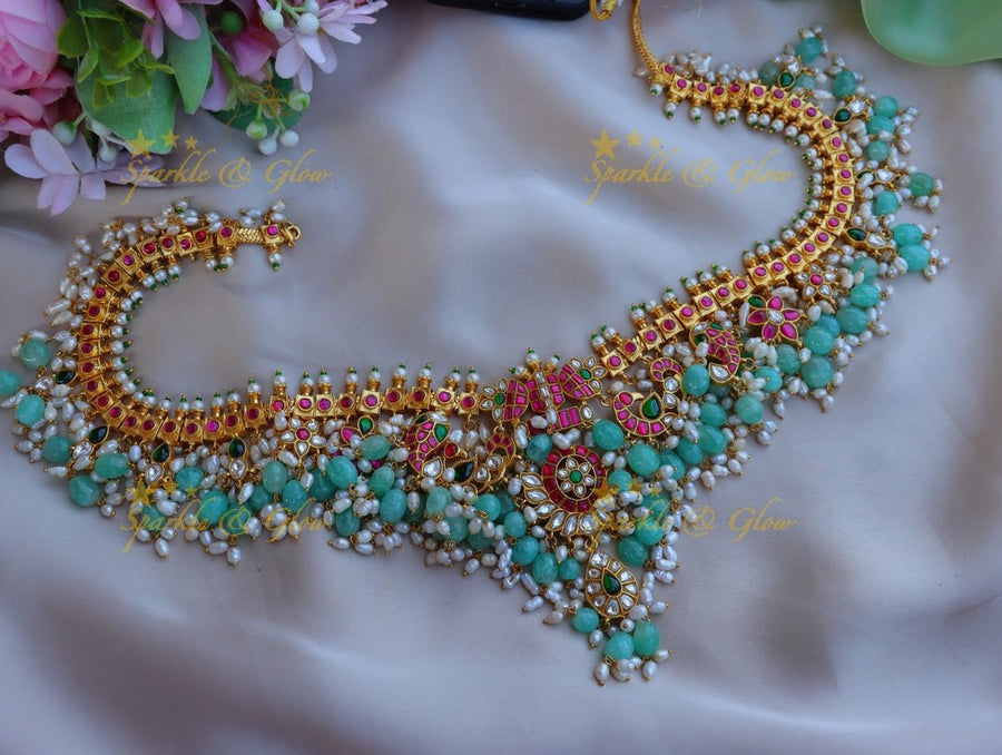 Pretty mango and floral design jadau hip chain with mint green and rice pearl beads - Sparkle and Glow - 