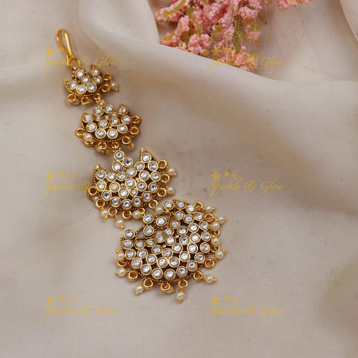 Gold alike half moon design tikka with gold beads