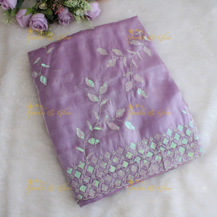 Beautiful leaf design lavender colour organza saree with dark purple blouse piece - Lavender