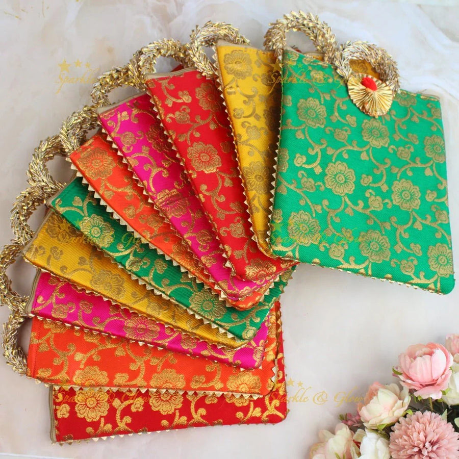 Stunning floral design potli bags - set of 10 - Assorted colours for return gifts - Sparkle and Glow