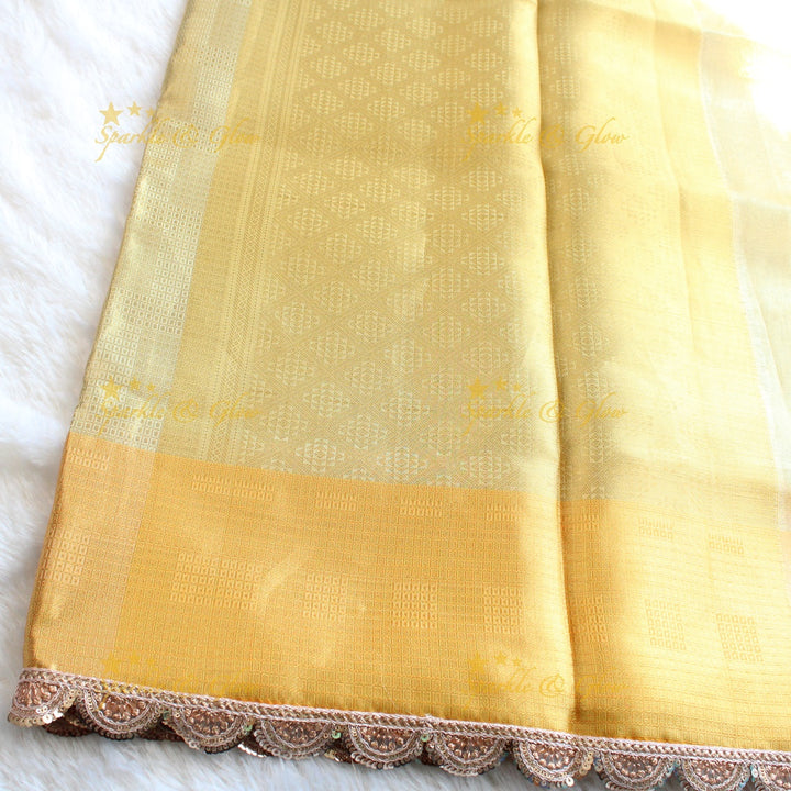 Beautiful light gold colour banarasi tissue silk saree with lace attached with blouse piece