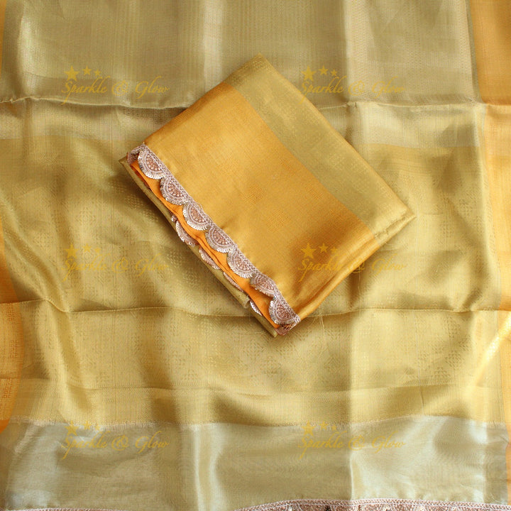 Beautiful light gold colour banarasi tissue silk saree with lace attached with blouse piece