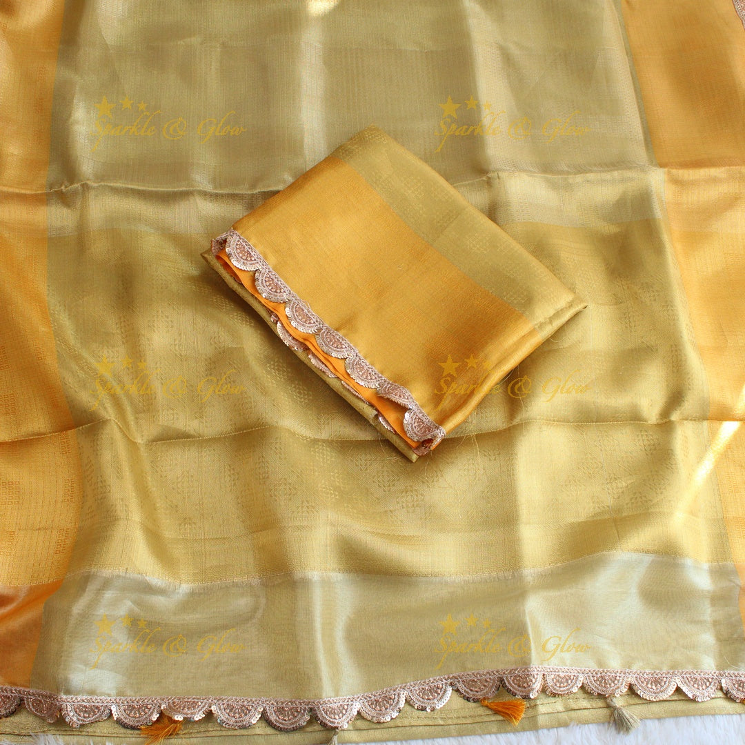 Beautiful light gold colour banarasi tissue silk saree with lace attached with blouse piece