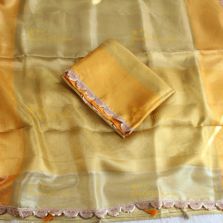 Beautiful light gold colour banarasi tissue silk saree with lace attached with blouse piece