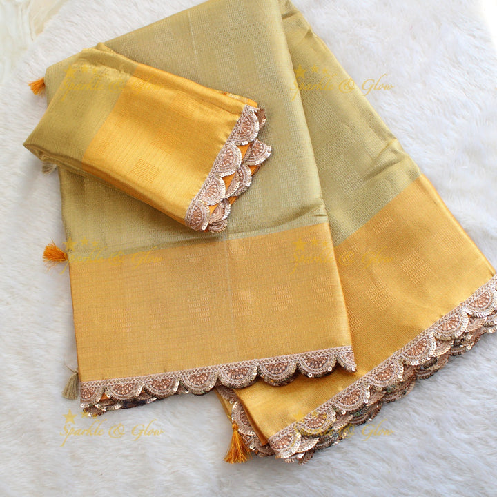 Beautiful light gold colour banarasi tissue silk saree with lace attached with blouse piece