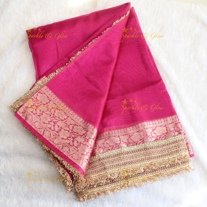 Beautiful pink colour banarasi tissue silk saree with lace attached with blouse piece