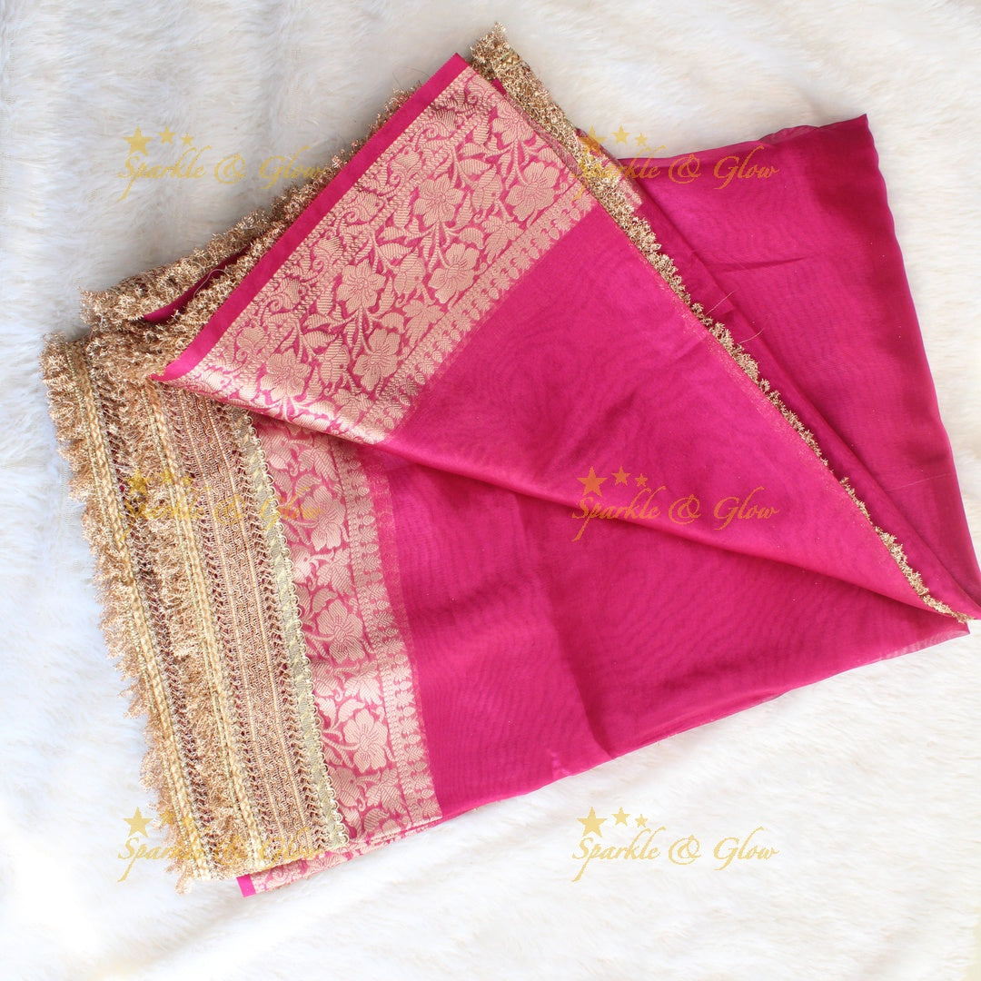 Beautiful pink colour banarasi tissue silk saree with lace attached with blouse piece