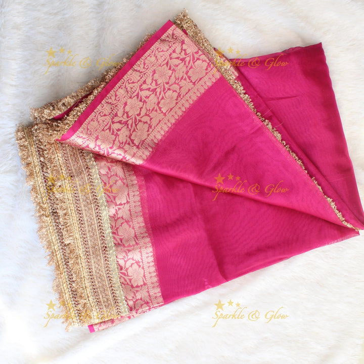 Beautiful pink colour banarasi tissue silk saree with lace attached with blouse piece