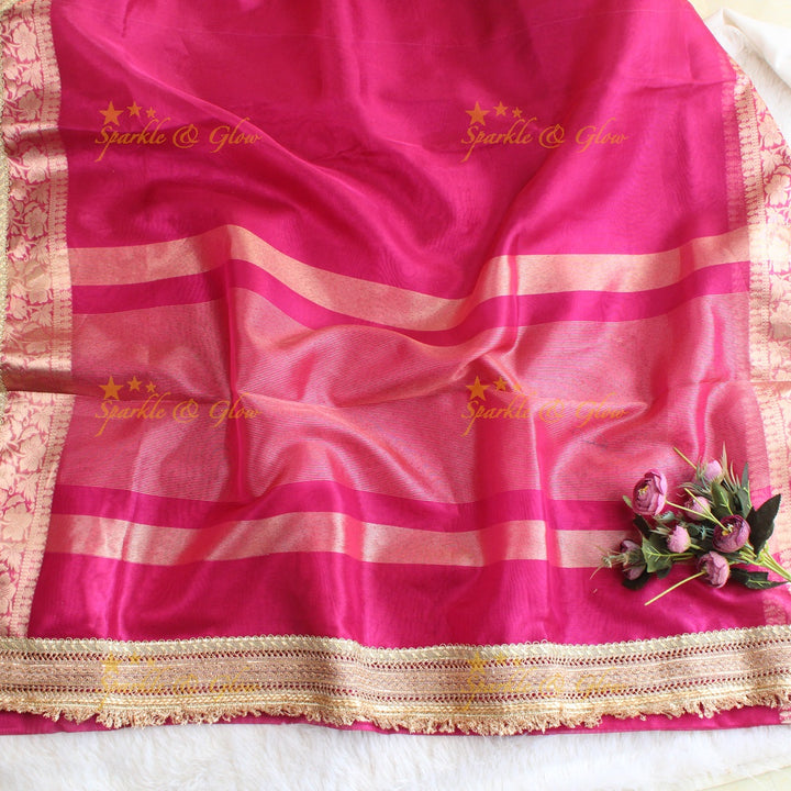 Beautiful pink colour banarasi tissue silk saree with lace attached with blouse piece