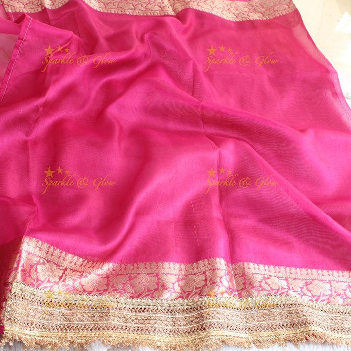 Beautiful pink colour banarasi tissue silk saree with lace attached with blouse piece
