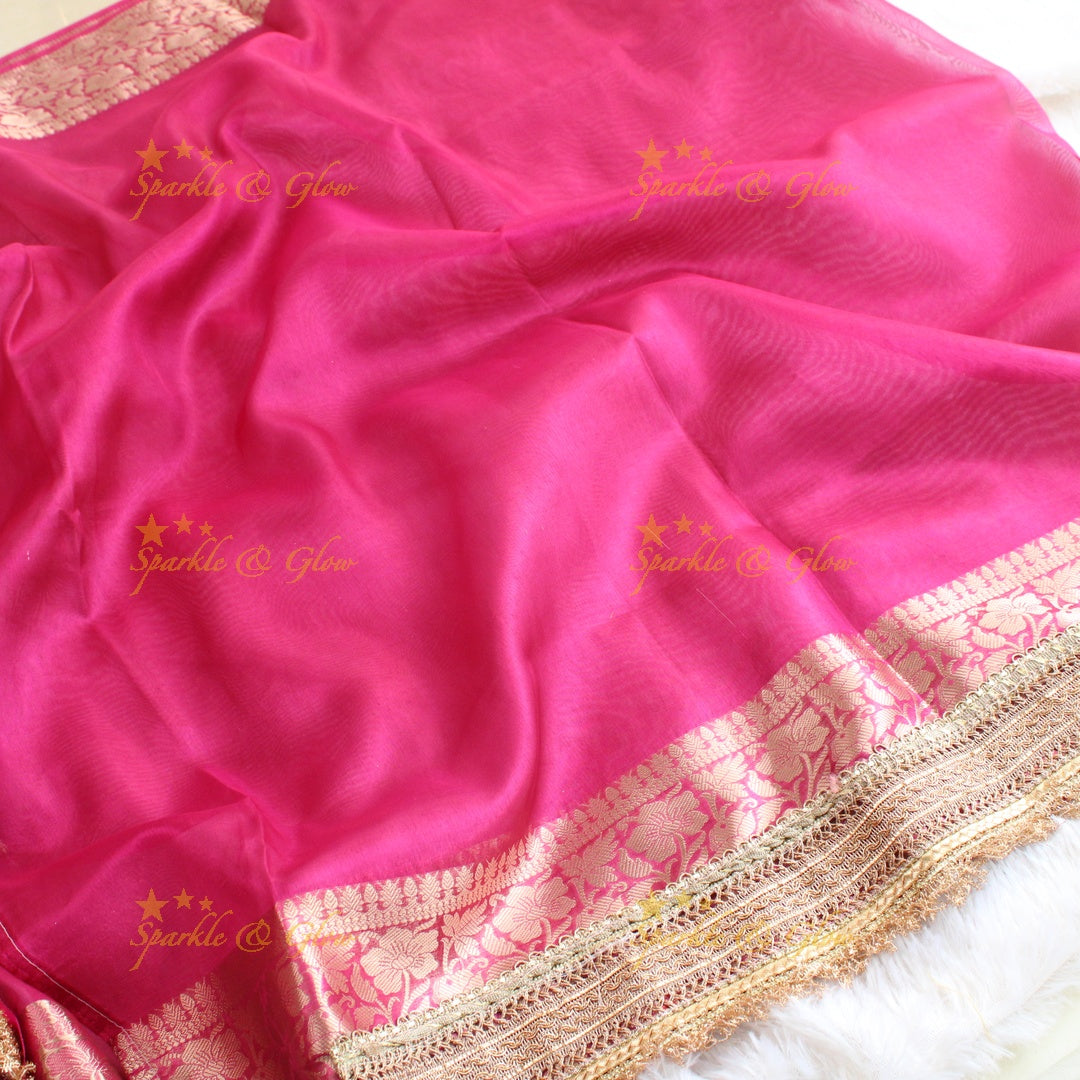 Beautiful pink colour banarasi tissue silk saree with lace attached with blouse piece