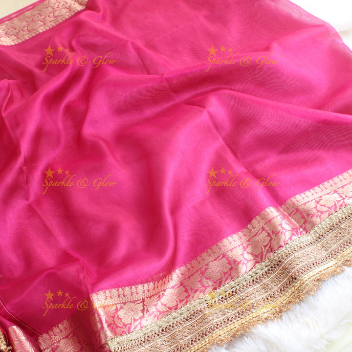 Beautiful pink colour banarasi tissue silk saree with lace attached with blouse piece