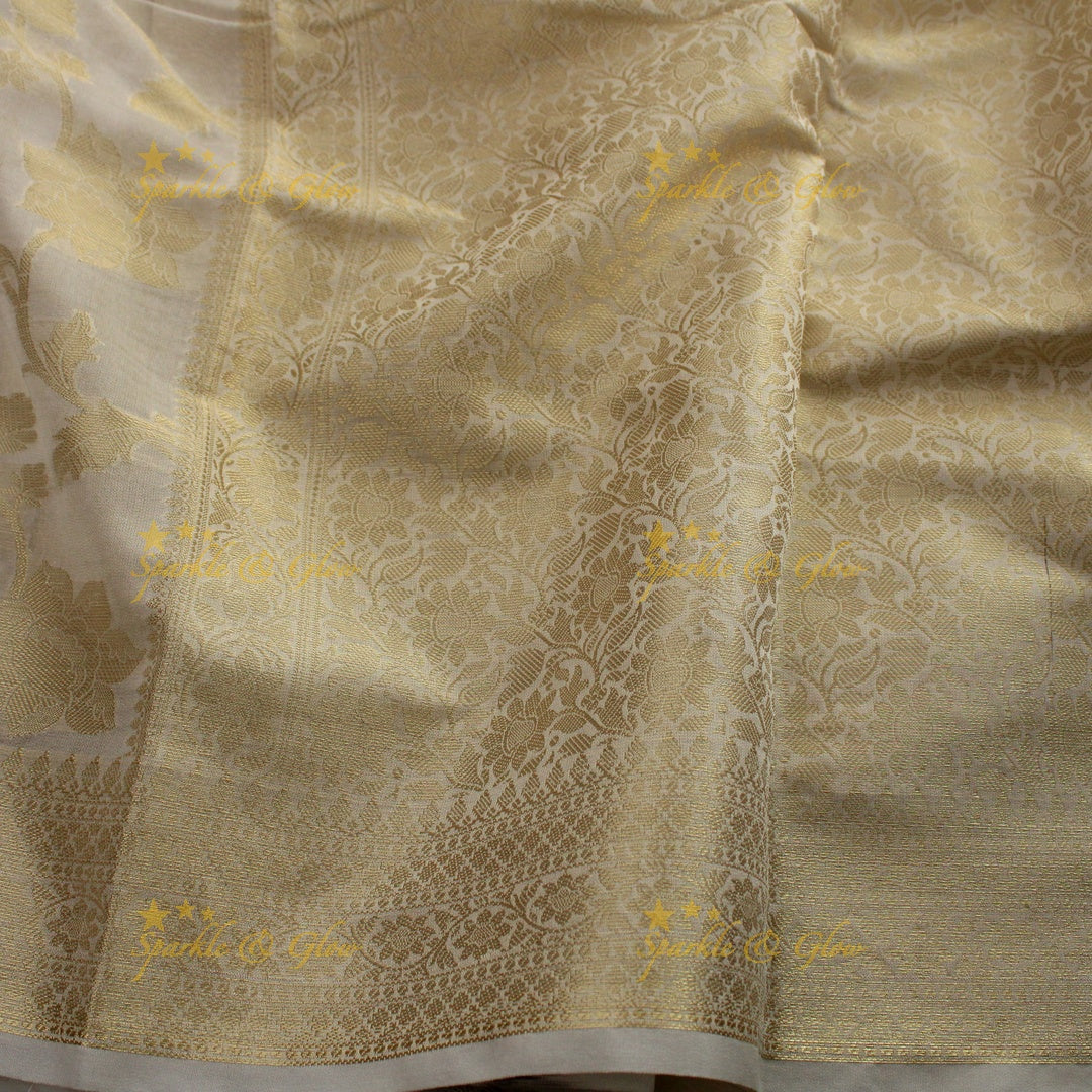 Beautiful white and gold colour floral print Banarasi Tissue Silk saree with blouse piece - White