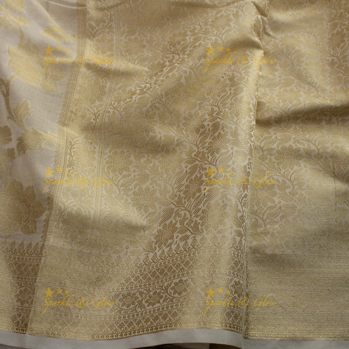 Beautiful white and gold colour floral print Banarasi Tissue Silk saree with blouse piece - White
