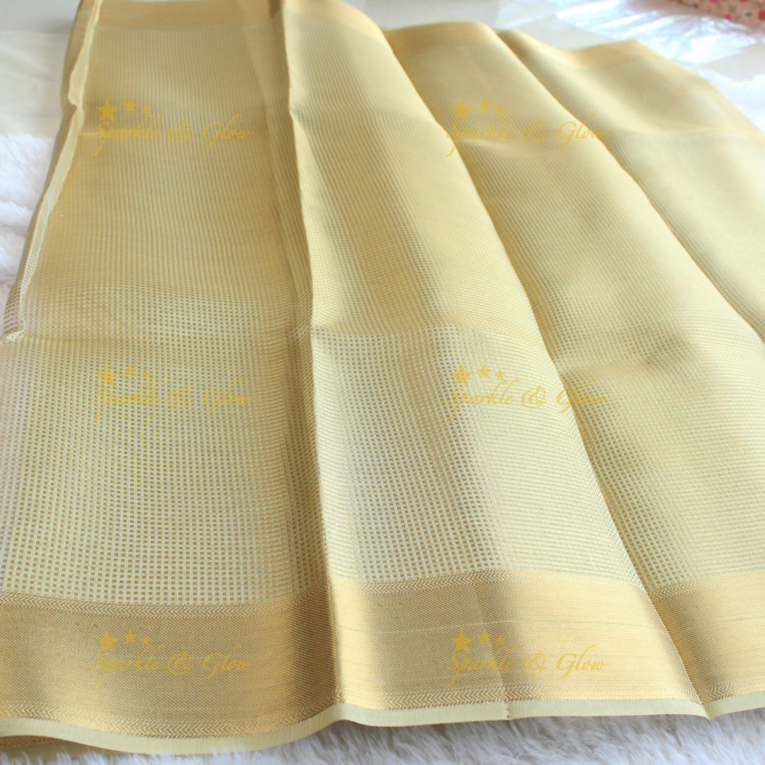 Nayanthara inspired Simple and elegant cream colour banarasi tissue silk saree with blouse piece