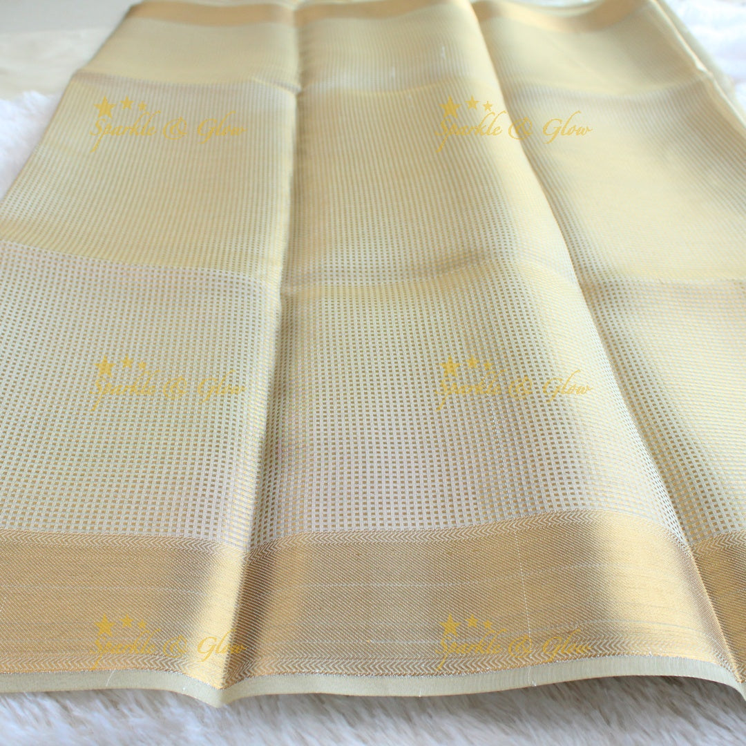 Nayanthara inspired Simple and elegant cream colour banarasi tissue silk saree with blouse piece