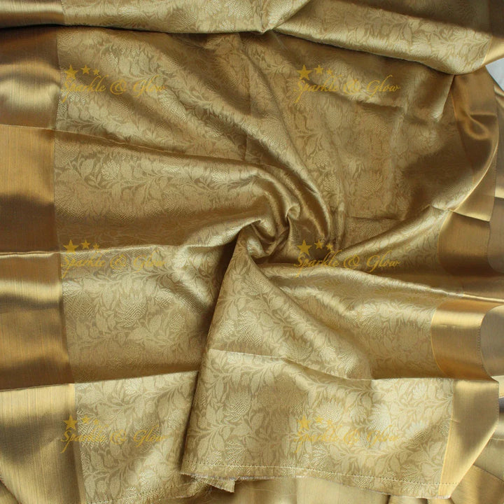 Nita Ambani Simple and elegant leaf and floral design gold colour banarasi tissue silk saree with blouse piece - Sparkle and Glow