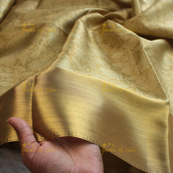 Nita Ambani Simple and elegant leaf and floral design gold colour banarasi tissue silk saree with blouse piece - Sparkle and Glow