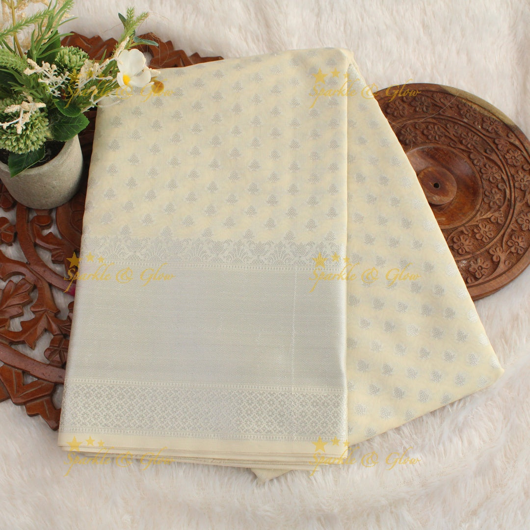 Simple cream colour banarasi tissue silk saree with blouse piece