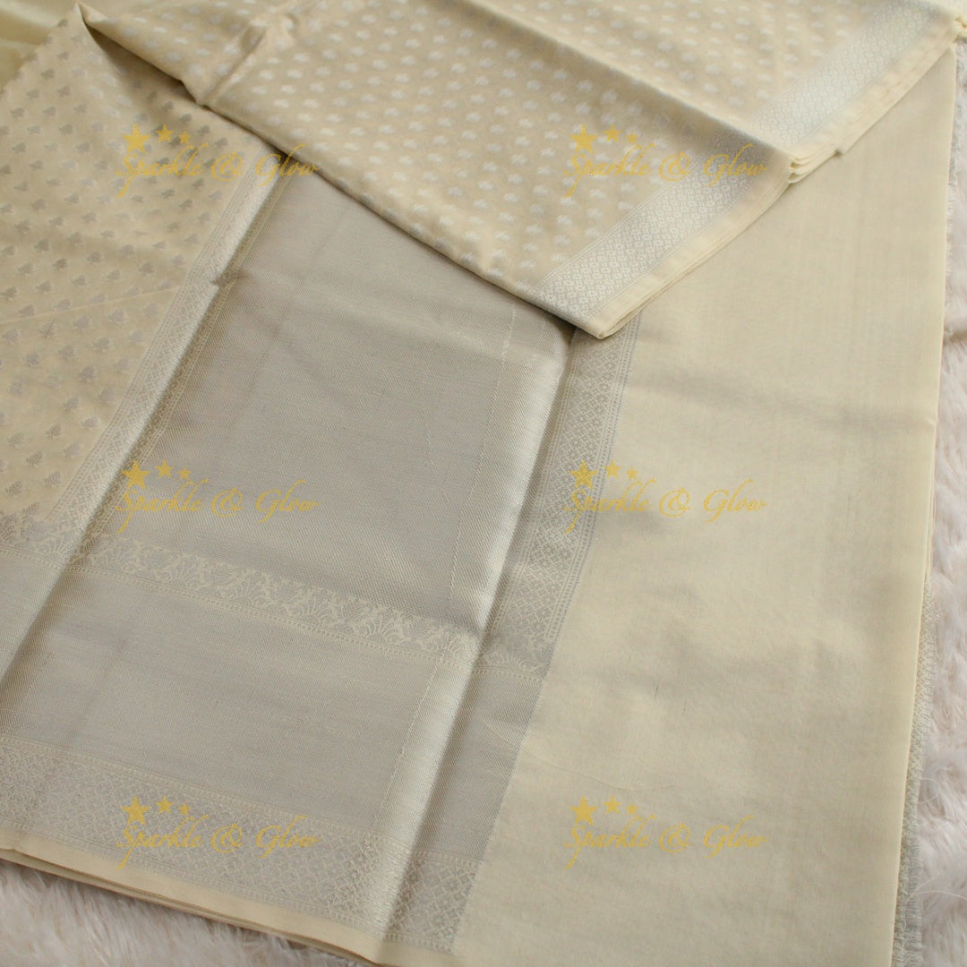 Simple cream colour banarasi tissue silk saree with blouse piece