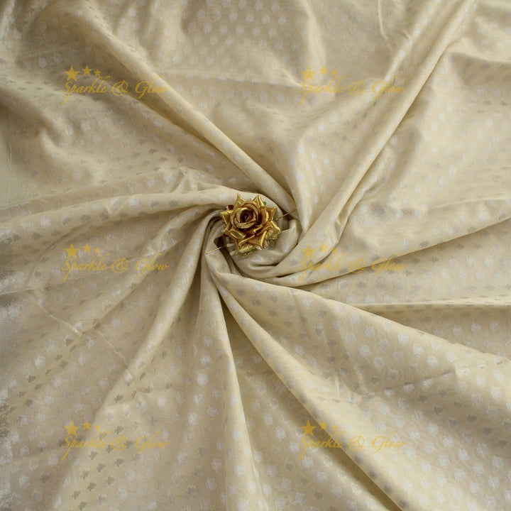 Simple cream colour banarasi tissue silk saree with blouse piece