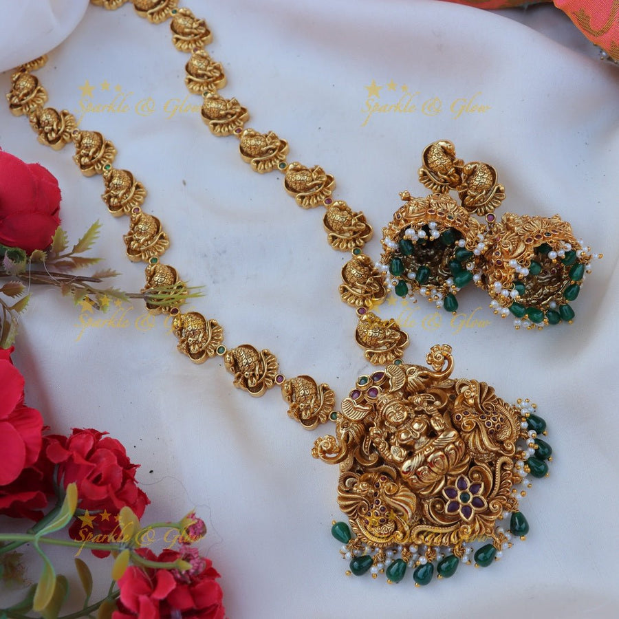 Elegant Idol Lakshmi Peacock Floral carved Haram with green beads - Sparkle and Glow - 