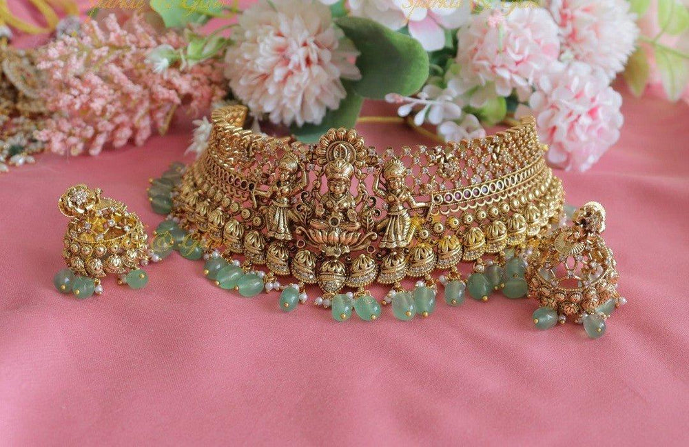 Antique Gold alike Lakshmi Choker Set with Green Beads & Jhumka Earrings - Sparkle and Glow