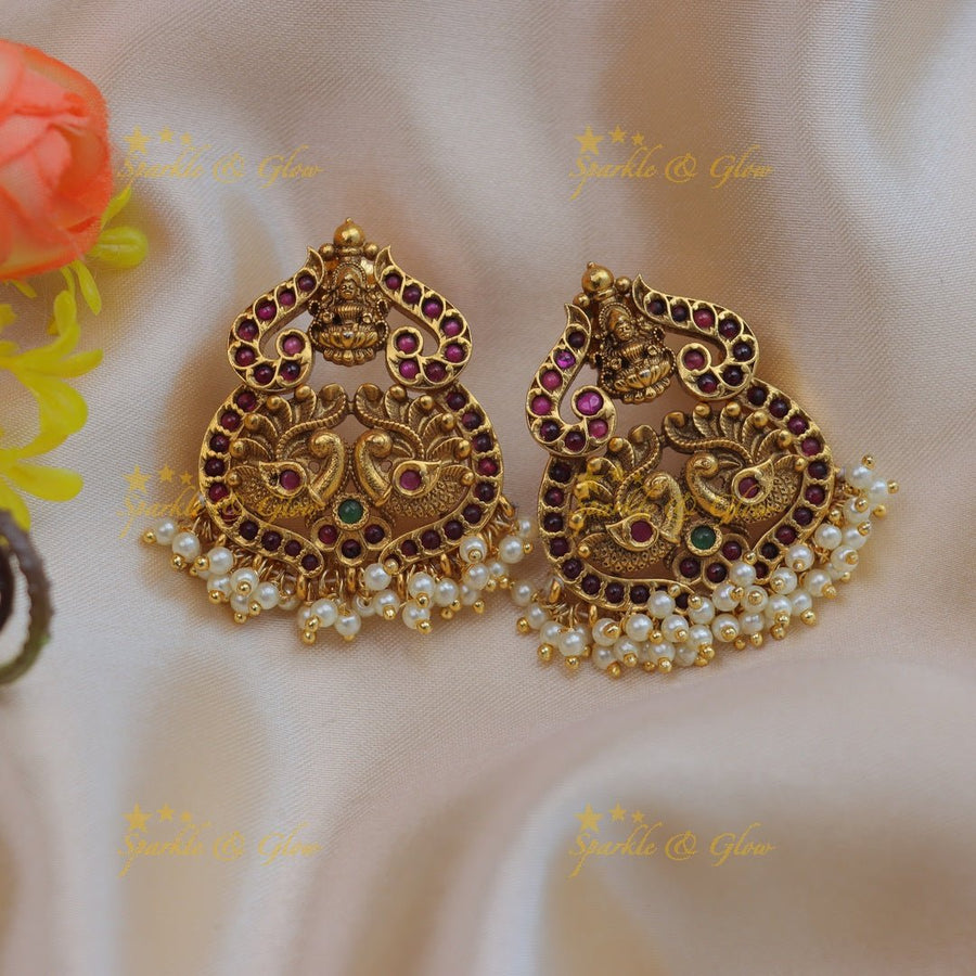 Elegant lakshmi and peacock design gold plated antique earrings - Sparkle and Glow - 