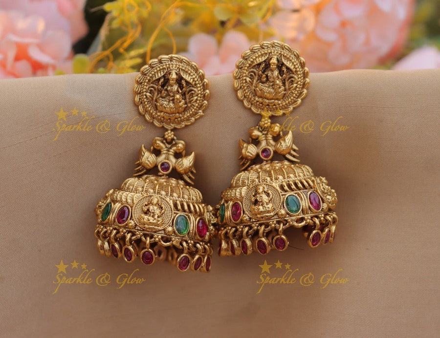 Gold alike Idol Lakshmi Peacock carved Kemp jhumuka - Sparkle and Glow - 
