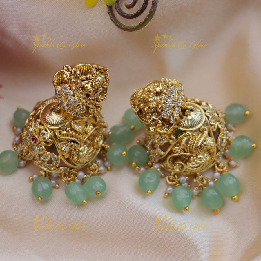 Stunning Cz Stones lakshmi design and mint green beads jhumukas - Sparkle and Glow - 