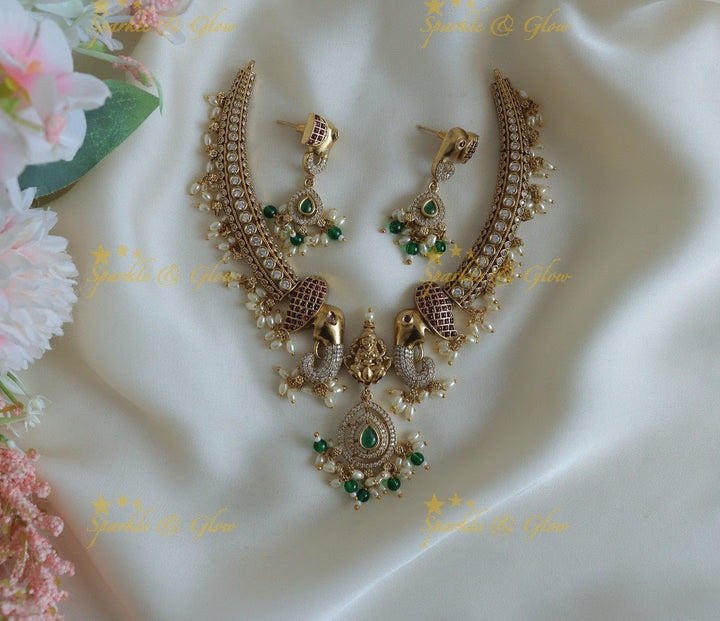 Stunning Dual tone Elephant Lakshmi carved Hasli short necklace - Sparkle and Glow - 