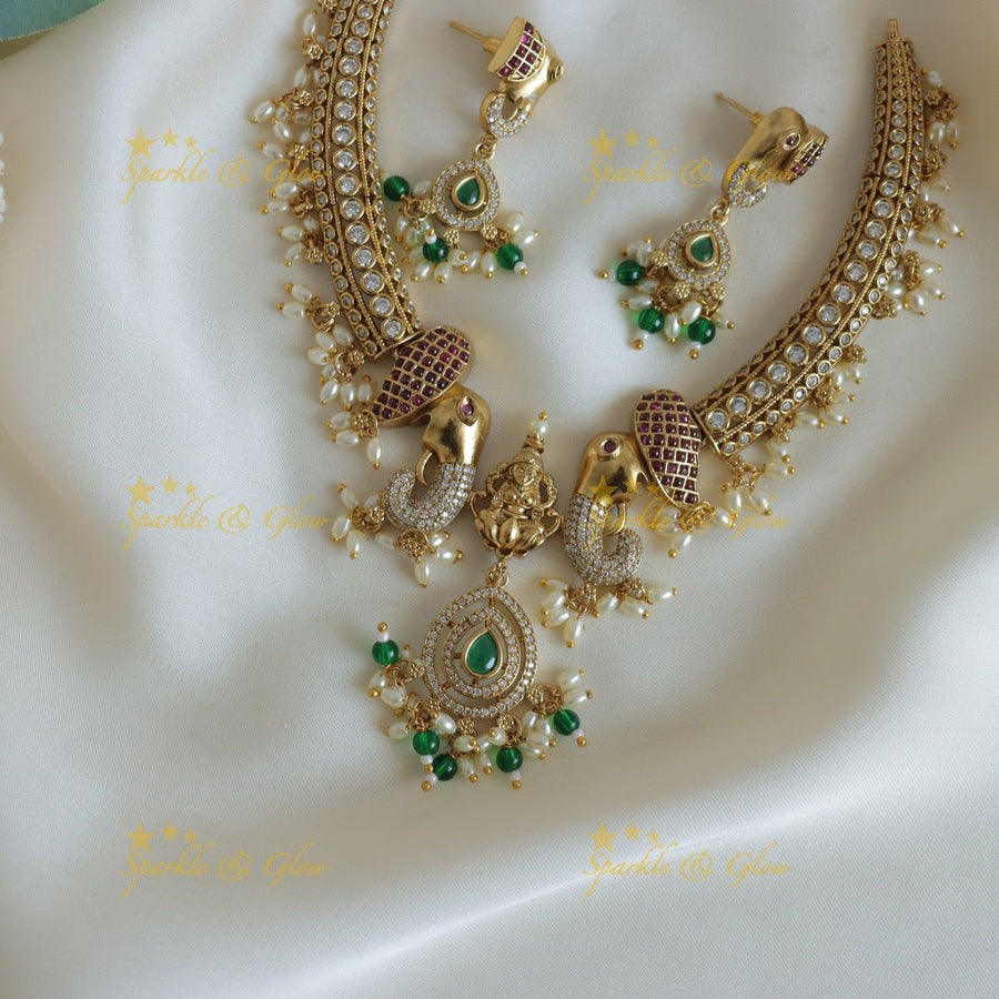 Stunning Dual tone Elephant Lakshmi carved Hasli short necklace - Sparkle and Glow - 