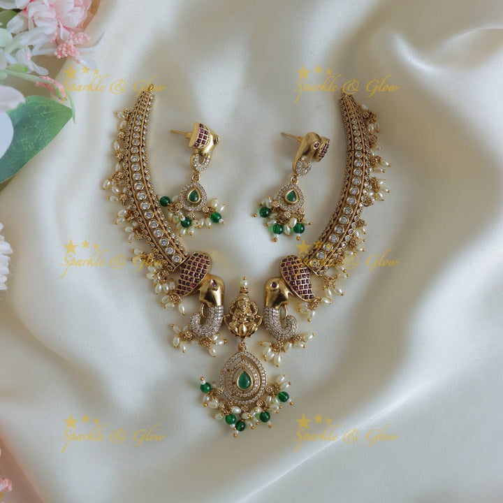 Stunning Dual tone Elephant Lakshmi carved Hasli short necklace - Sparkle and Glow - 