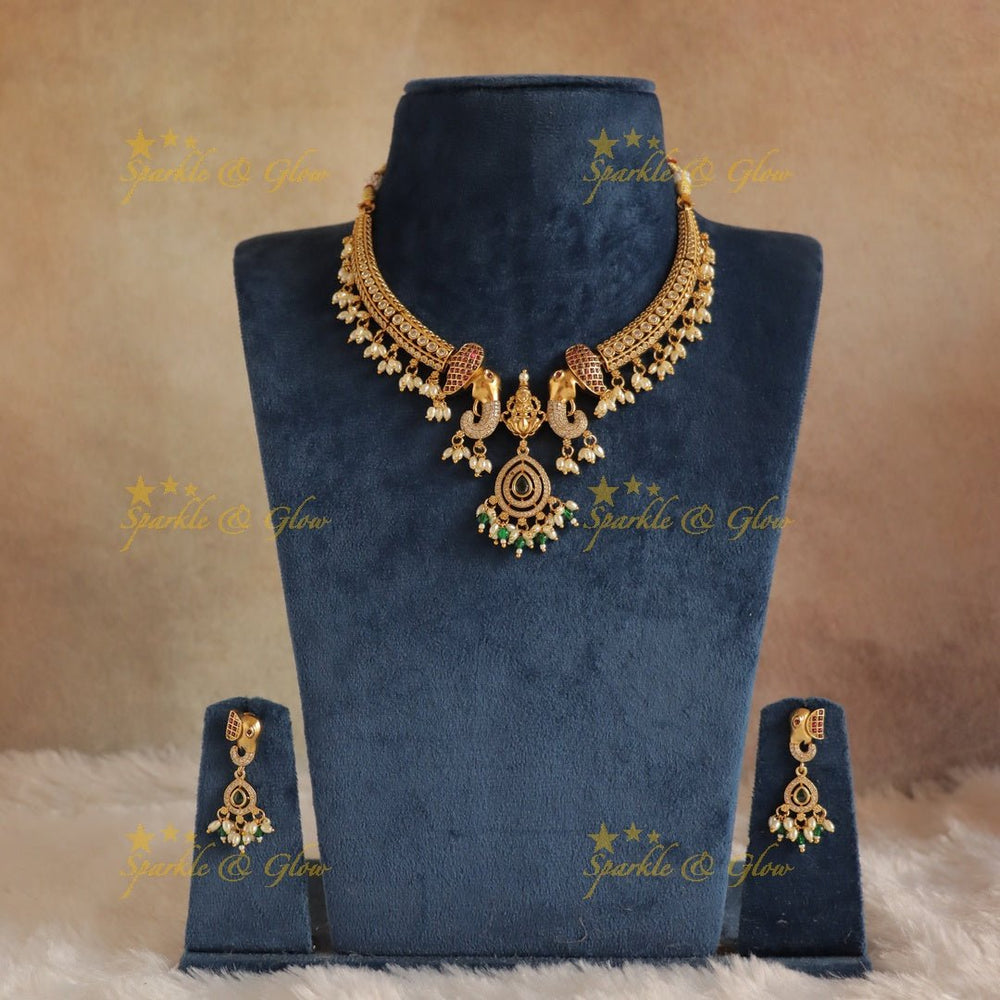 Stunning Dual tone Elephant Lakshmi carved Hasli short necklace - Sparkle and Glow - 