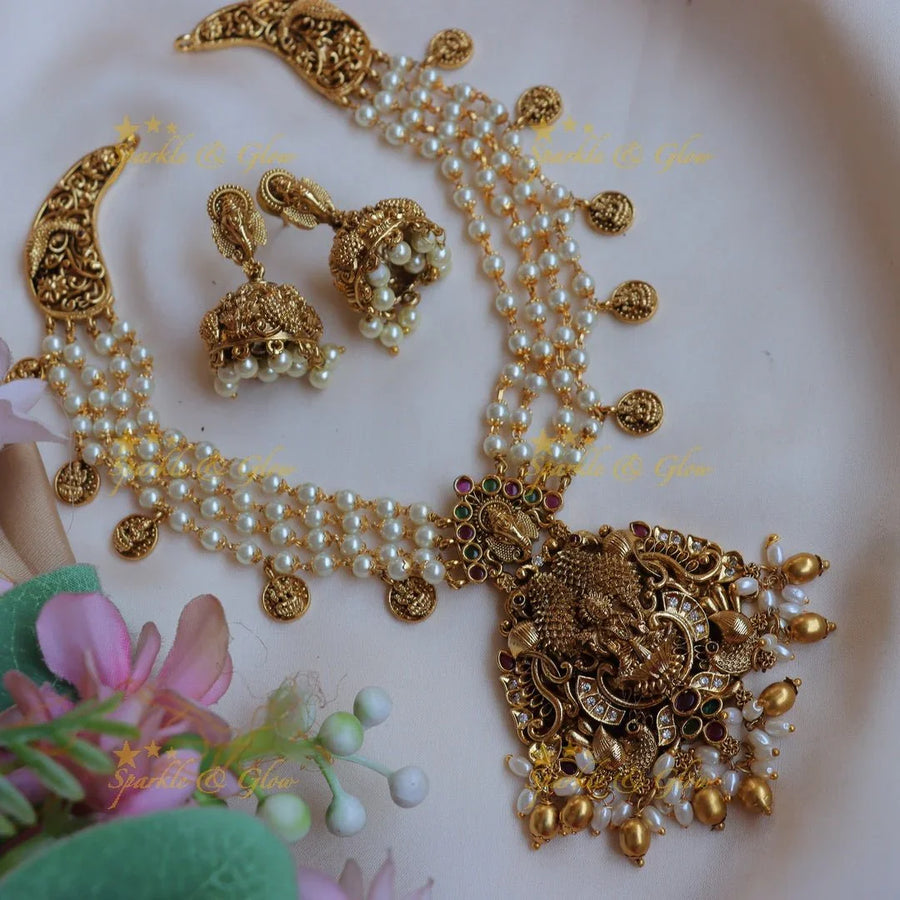 Stunning Pearl layered Idol Lakshmi Ganesha carved short necklace - Sparkle and Glow