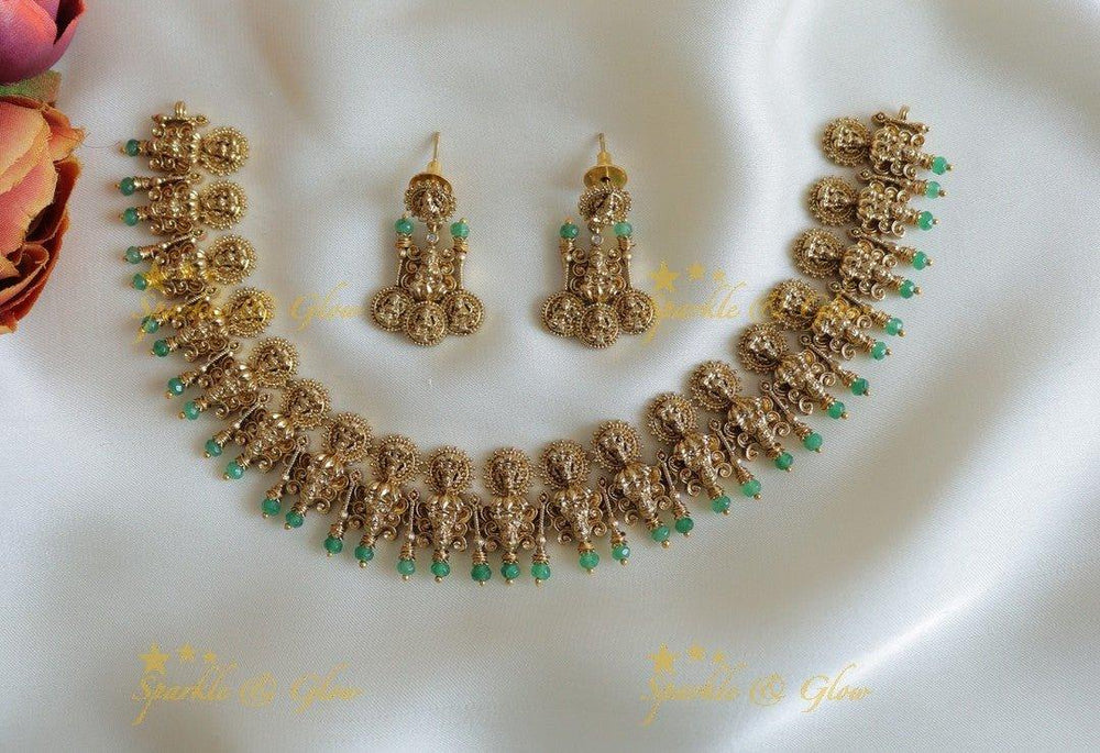 Intricately carved Idol Lakshmi coin design short necklace - Sparkle and Glow